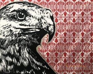 A print of a black-and-white hawk is outlined on silver. It is overlaid on a background with a red and white pattern.